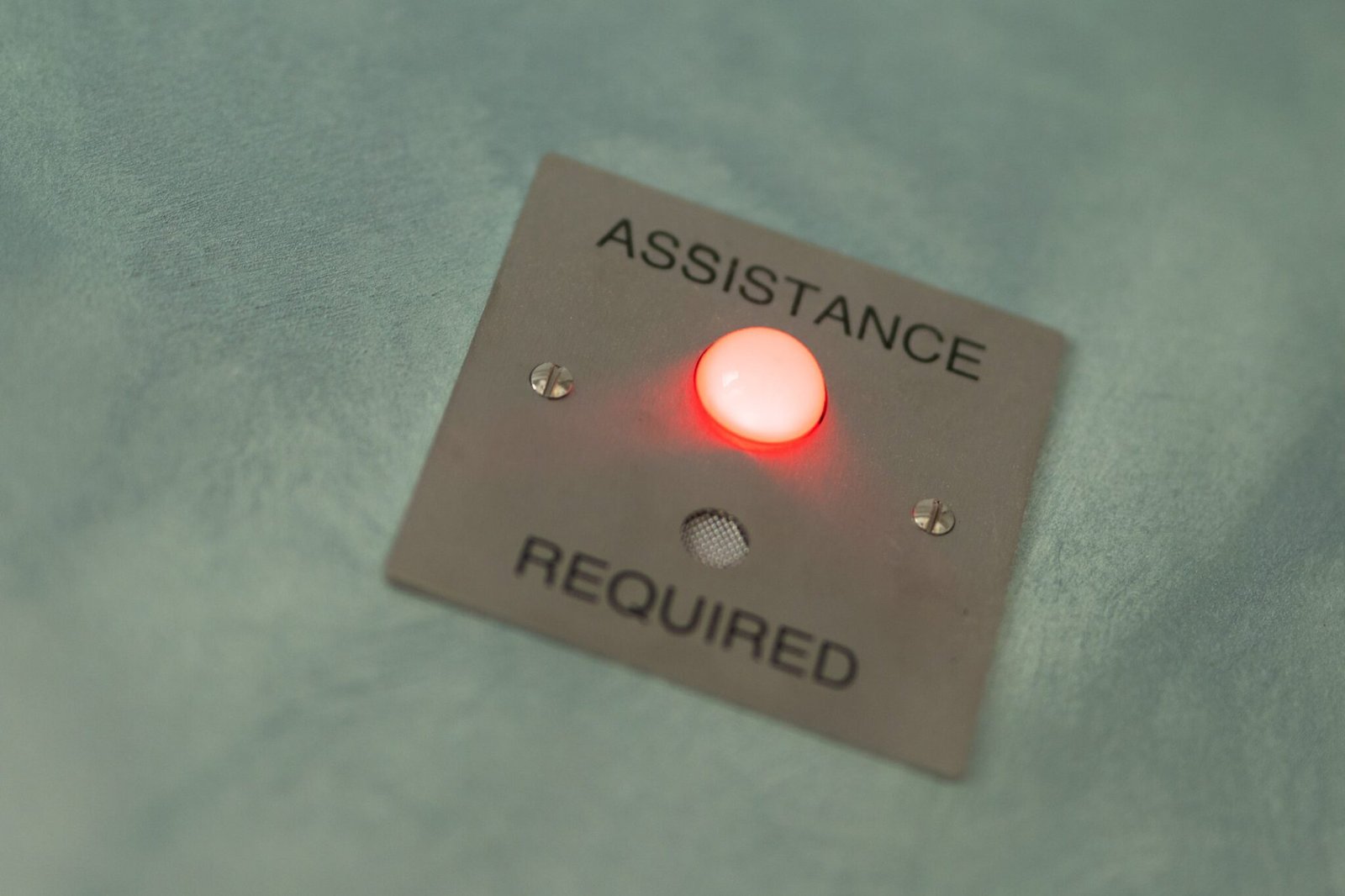 Assistance alert light and alarm