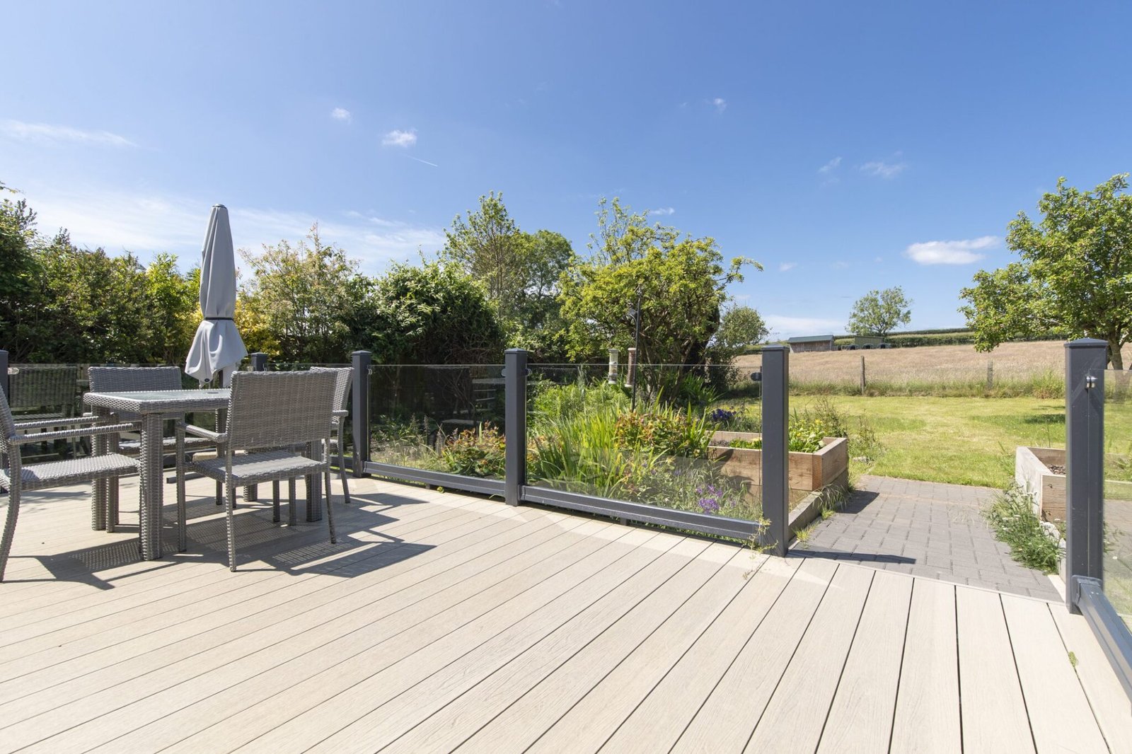 Rear garden deck with ramped access to level rear garden - Copy