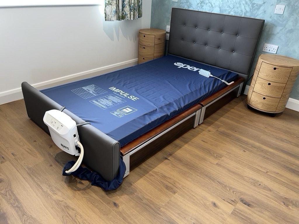 The Operal Impulse Hybrid Airflow mattress and versatile profiling bed at floor level