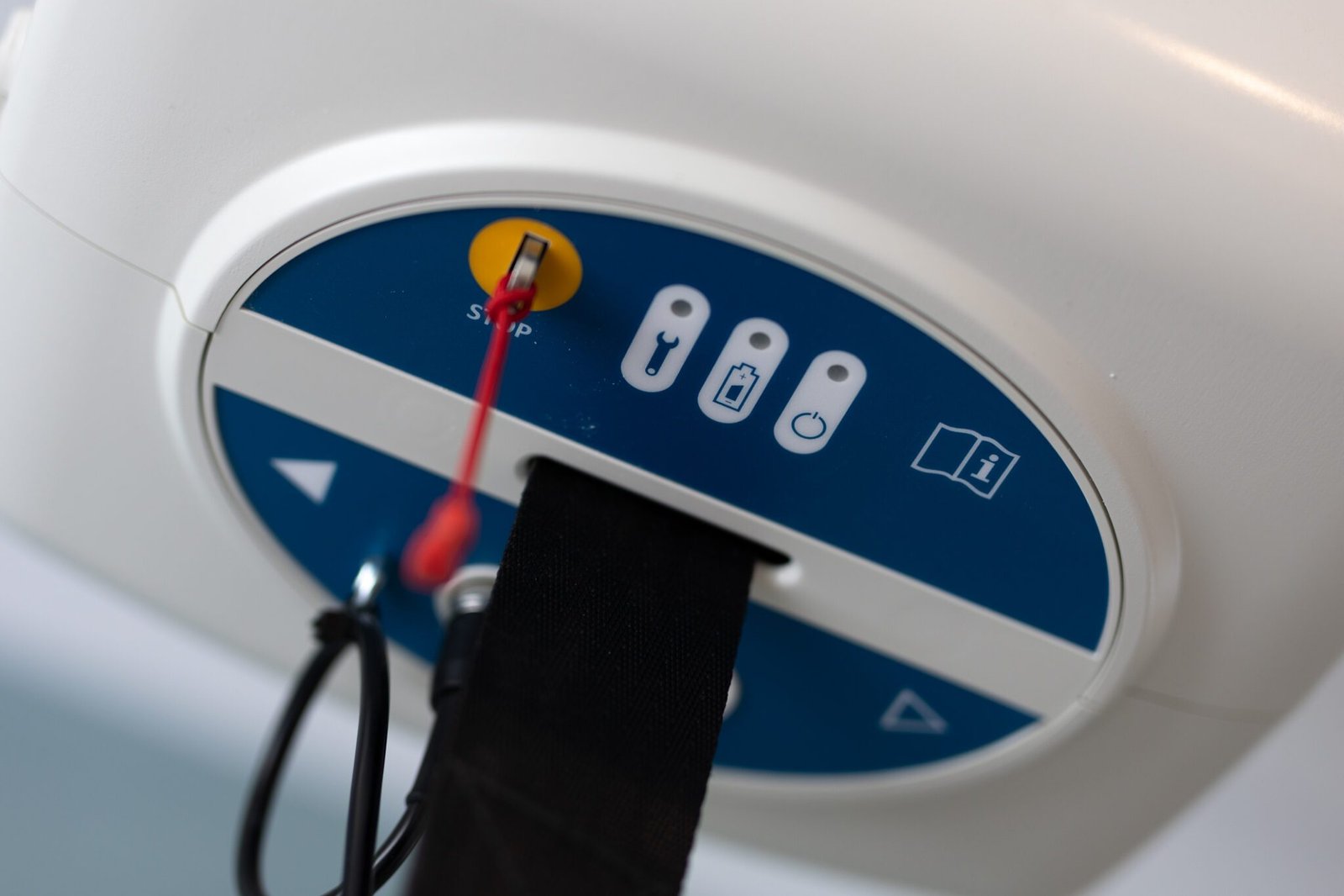 Ceiling hoist emergency stop and release